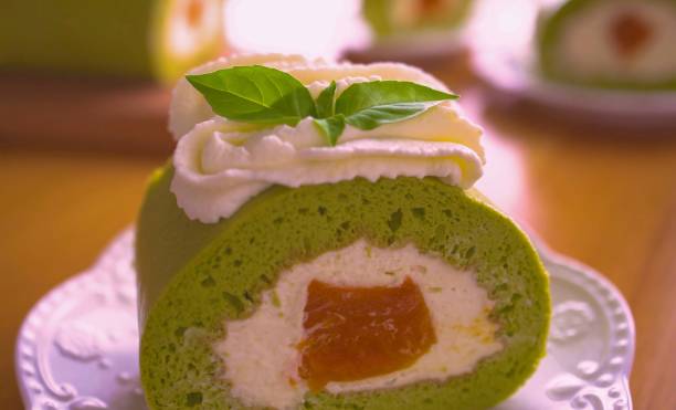istock pandan cake. Pandan swiss roll cake. Pandan roll cake 1364927342