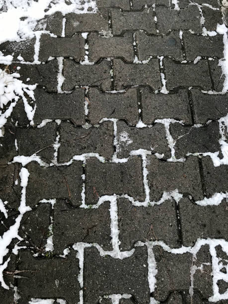 istock snowy cobble stone street floor 1364928722