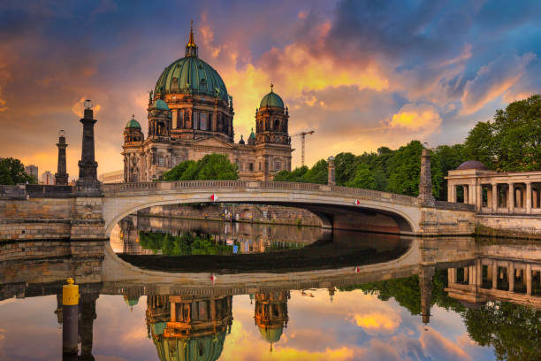 Berlin Cathedral reflected in Spree River at sunrise