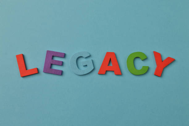 istock Colorful alphabet letters with text LEGACY isolated on a blue background 1364932712