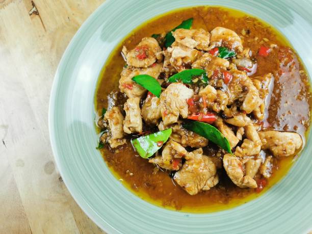 istock Fried chicken with lemongrass in a plate, ready to serve 1364934502