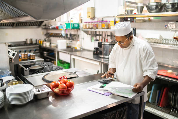 istock Doing the books is the head chef's job 1364935484