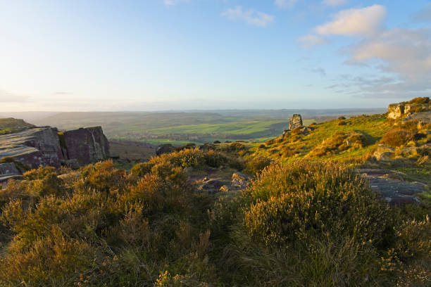 istock Sunrise on a misty winter morning high on Curbar Edge 1364940160