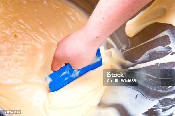 Baker Taking Fresh Prepared Dough Out Of A Mixer Stock Photo - Download Image Now - Bakery, Batter - Food, Appliance