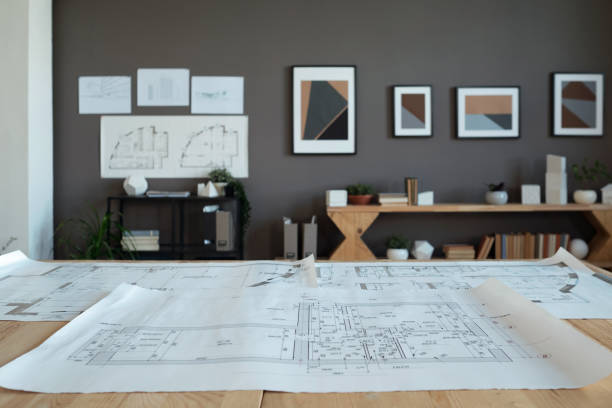 istock Contemporary office of engineers or architects with their workplace 1364947192