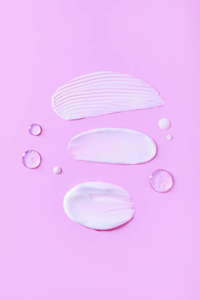 istock cosmetic smears cream texture on pastel pink background 1364947494