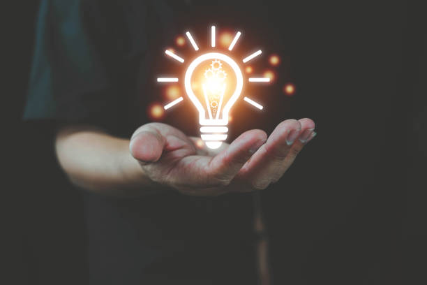 istock Business hand showing creative business strategy with light bulb as concept, Innovation through ideas and inspiration ideas idea of creativity, Light bulbs ideas the business concept. 1364950790