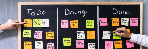 istock Group Of People Writing On Sticky Notes 1364959136