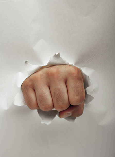 istock Faust strikes through a sheet of paper 1364960291