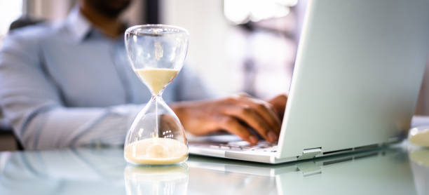 istock Financial Deadline And Hourglass In Office 1364960416