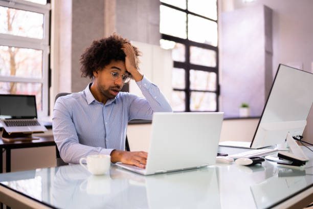 istock Tired African American Man With Headache 1364960432