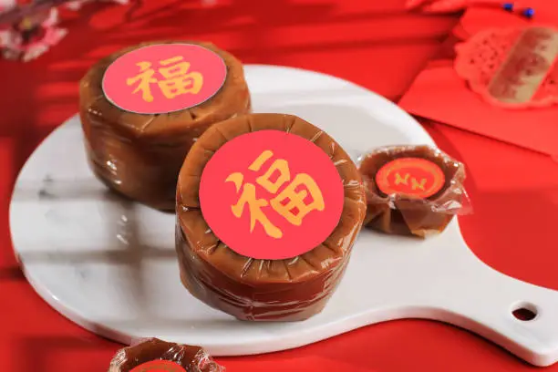 Photo of Kue Keranjang or Nian Gao, Popular Cake for Chinese New Year Festival with Red Concept. Made from Sugar and Flour.