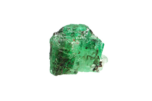 Closeup natural rough emerald (green beryl) crystal with mica inclusion