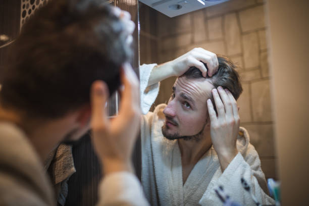 istock Middle aged man in the bathroom 1364968293