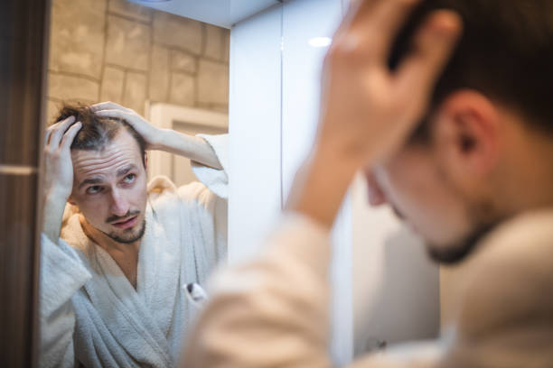 istock Middle aged man in the bathroom 1364968353