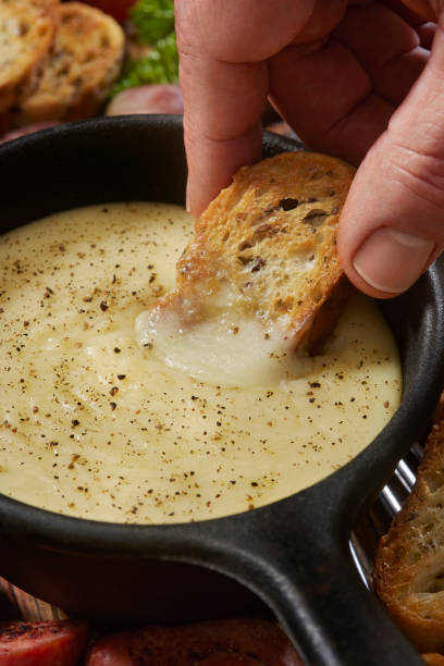 istock Cheese Fondue with French Bread 1364969486