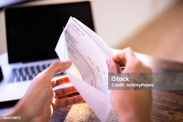 Payroll Cheque In Envelope Stock Photo - Download Image Now - Paycheck, Envelope, Check - Financial Item