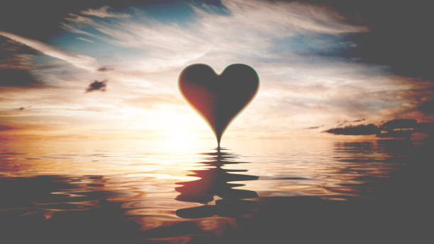istock Heart reflection in water at sunset. Valentines day 1364971190