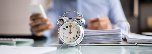 istock Businessperson Using Calculator For Calculating Bill 1364971467