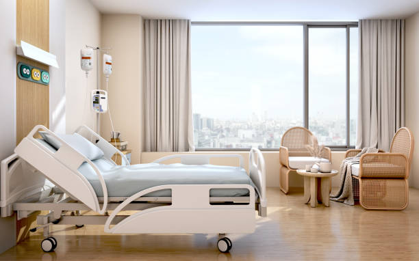 istock Hospital recovery room with beds and chairs.3d rendering 1364971557