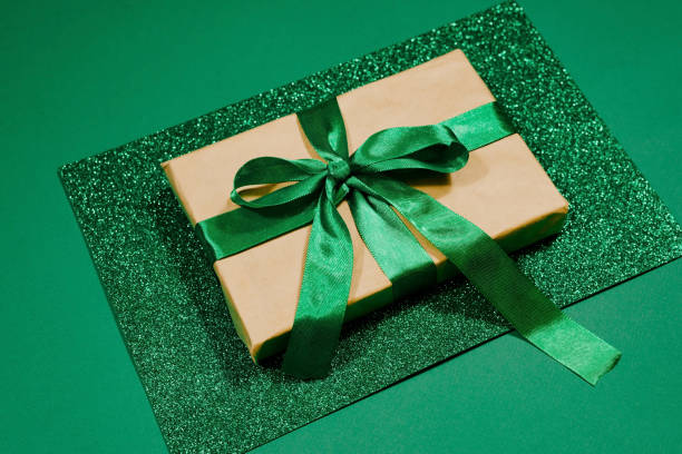 istock St.Patrick 's Day. Celebration. Green leprechaun hat, gift box on green background. 1364971760