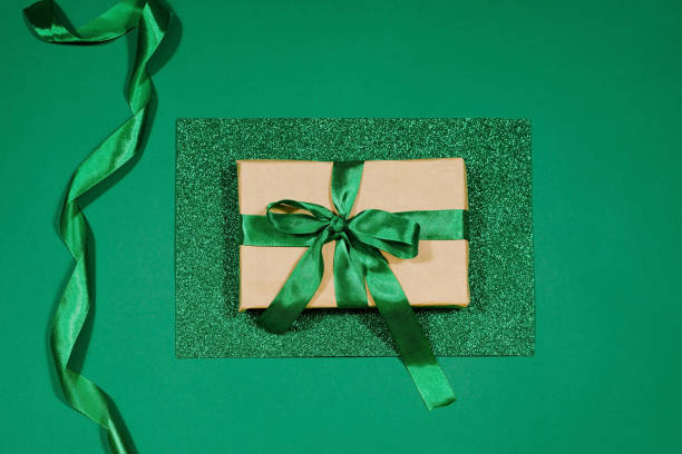 istock St.Patrick 's Day. Celebration. Green leprechaun hat, gift box on green background. 1364971763