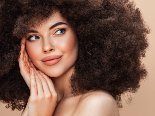 istock Beautiful woman with afro hairstyle 1364973930
