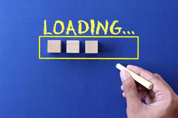 istock Hand draw loading bar and wooden cubes on blue background 1364974353