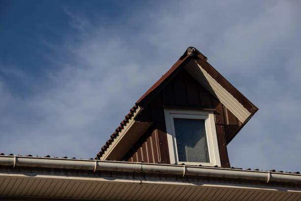 istock New roofing construction with attic skylights, rain gutter system, roof windows and roof protection from snow board, snow guard exterior 1364974485