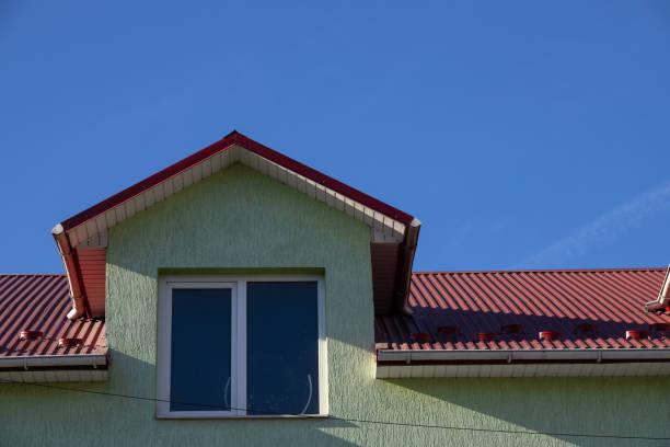 istock New roofing construction with attic skylights, rain gutter system, roof windows and roof protection from snow board, snow guard exterior 1364974504