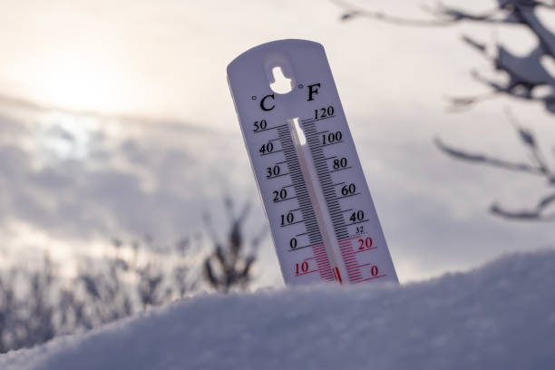 istock Low temperature thermometer in the snow in Celsius or Fahrenheit 1364974640