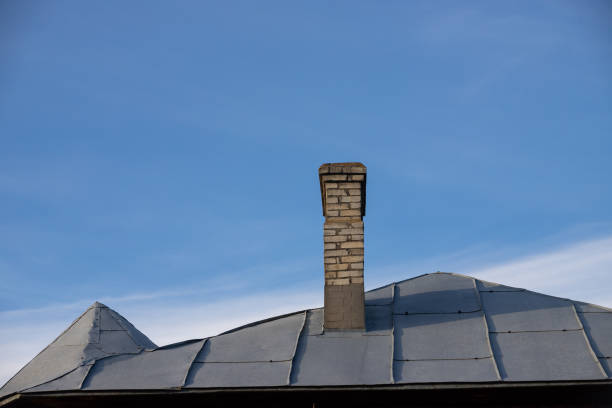 istock New roofing construction with attic skylights, rain gutter system, roof windows and roof protection from snow board, snow guard exterior 1364974730