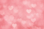 Defocused pink hearts background