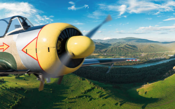 istock Small aircraft flying above in the blue sky 1364982162