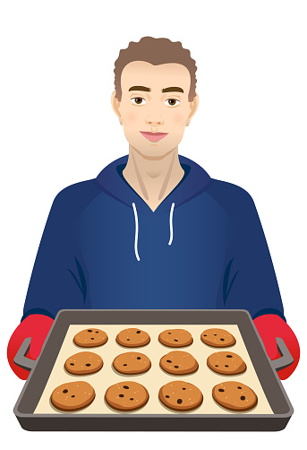 Young man with cookies tray
