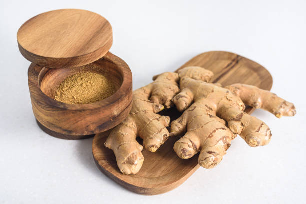 istock Ginger root and ginger powder in the bowl 1364983140