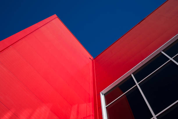 istock Low Angle View Of  Modern Office Building with Red Facade 1364987390