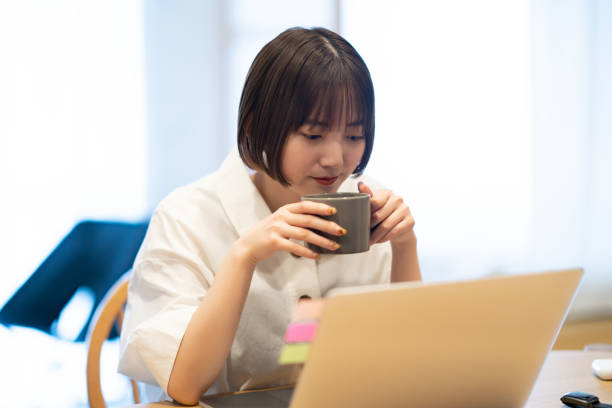 istock A woman taking a break while looking at her laptop 1364987649