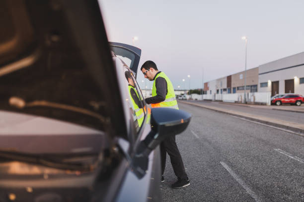 istock Man with car breakdown calling the assistance tow truck. 1364991950