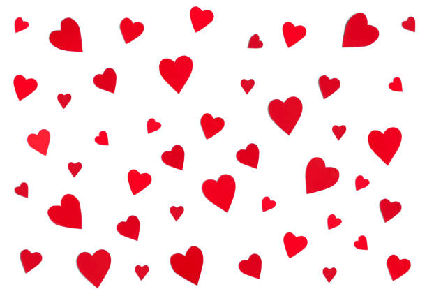 istock Red paper hearts pattern isolated on white background. St Valentines Day concept 1364992666