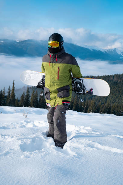 istock man snowboarder portrait carpathian mountains on background 1364993132