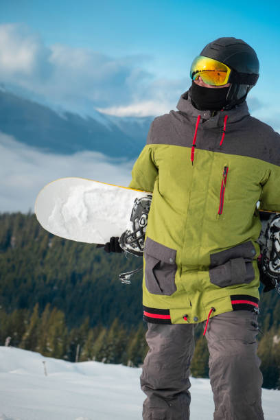 istock man snowboarder portrait carpathian mountains on background 1364993139