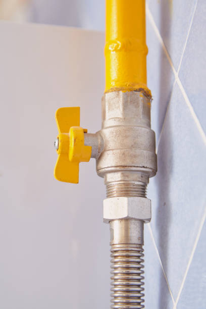 istock Yellow natural gas supply pipe close up 1364994705