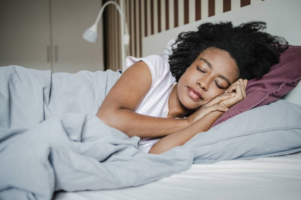 istock Young African American woman is sleeping 1364996223