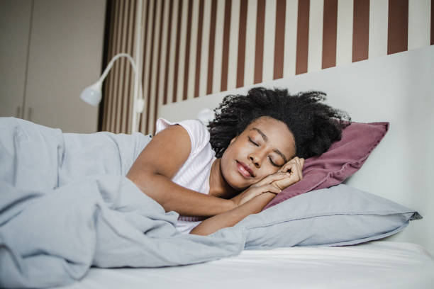 istock Young African American woman is sleeping 1364996912