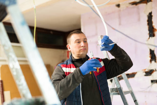 istock Electrician working with wires in apartment 1365004739