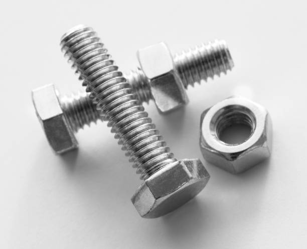 istock Metal nuts and bolts Isolated on white background 1365004977