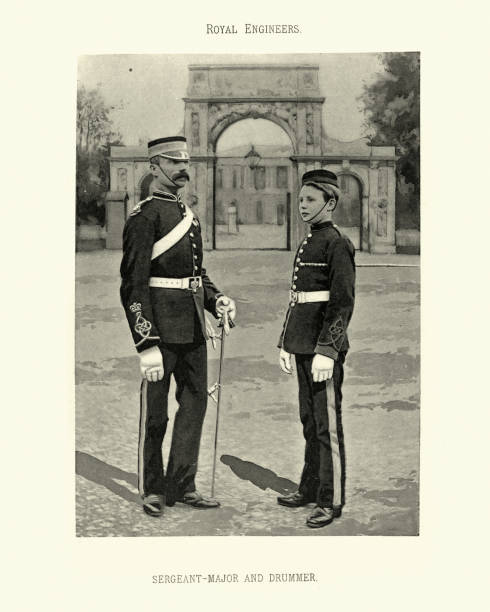 istock Sergeant major and drummer boy, British army Royal Engineers, Military uniform, Victorian 19th Century 1365009548