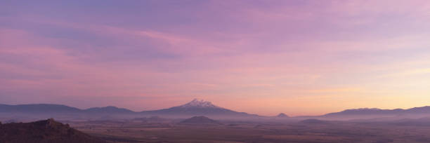 istock Mt Shasta Sunset with Fog 1365013350