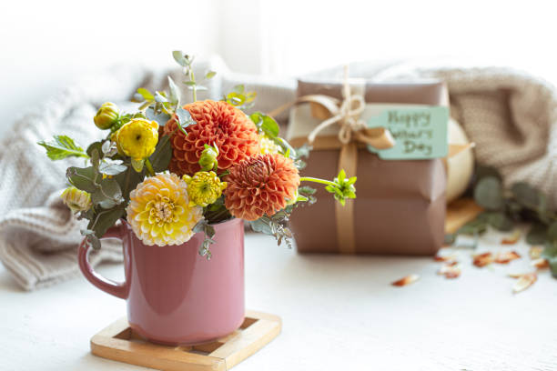 istock Festive composition for mother's day with gift box and flowers. 1365014748